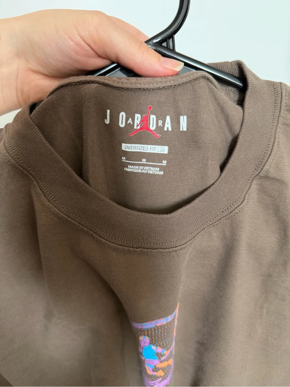 Jordan Brown Short Sleeve Tee with Small Flight Graphic